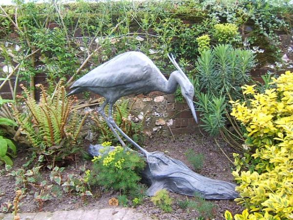 ‘Grey Heron (bronze life size Stalking garden/yard sculptures/statues)’ by Gill Parker
